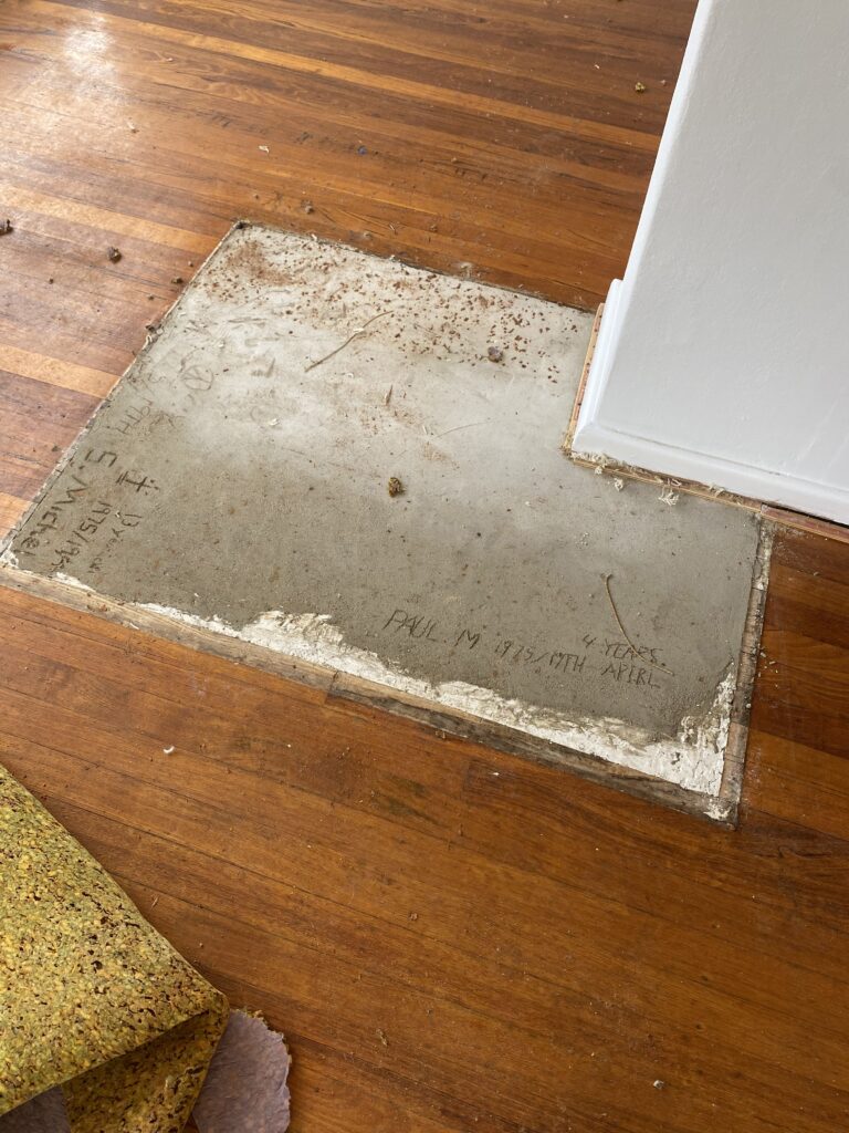 Wood floor sanding under carpet