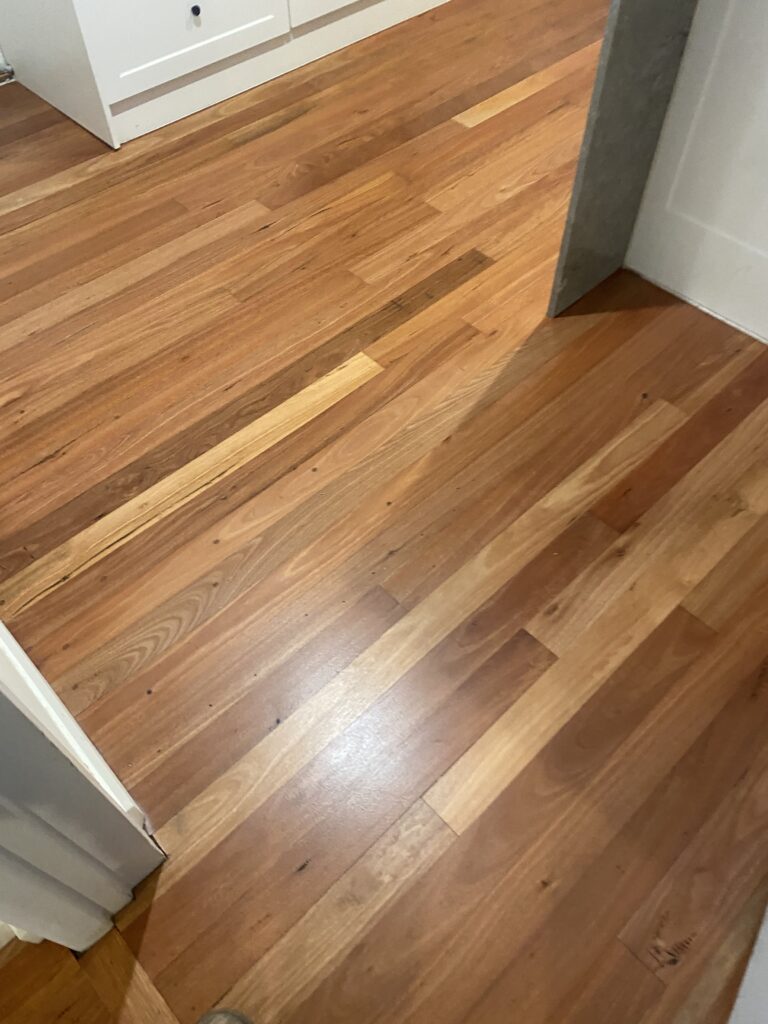 Blue Gum timber floor after sanding and Berger Seidle Ceramic Matt finish in Canberra