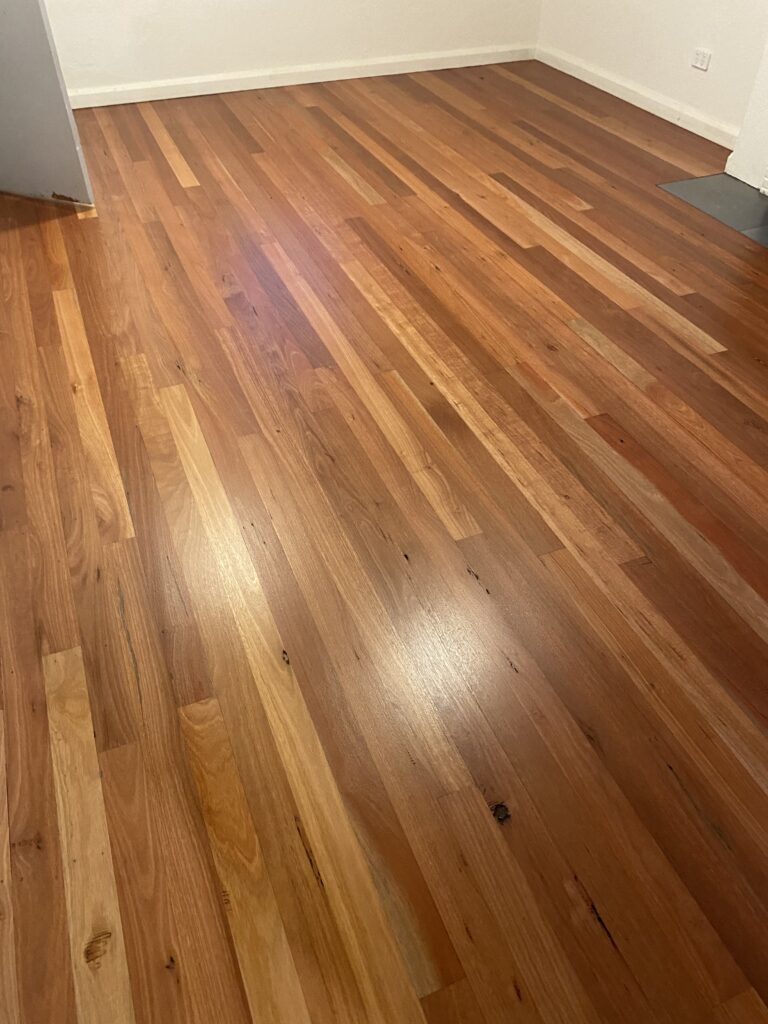 Blue Gum timber floor after sanding and Berger Seidle Ceramic Matt finish in Canberra