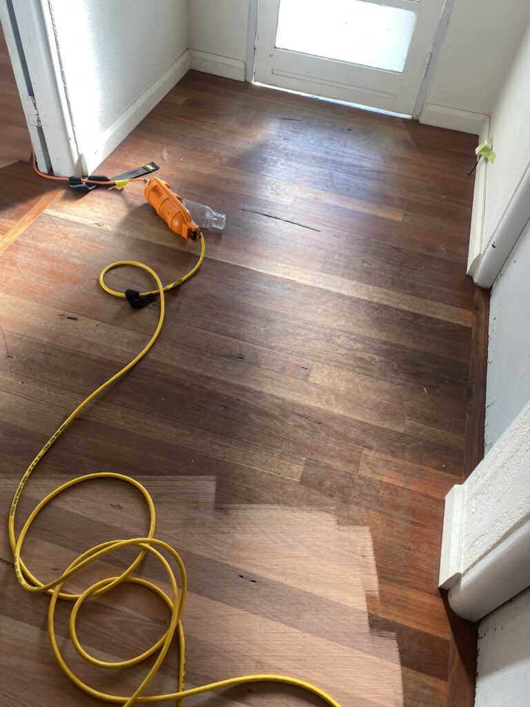 Worn Blue Gum timber floor before sanding in Canberra