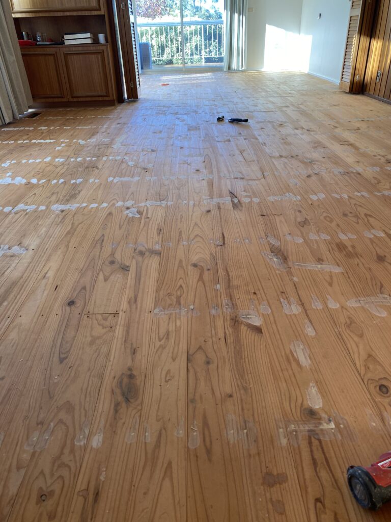 Pine timber floor before sanding and polishing in Belconnen Canberra